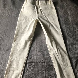 Cream stretch slacks from papaya.